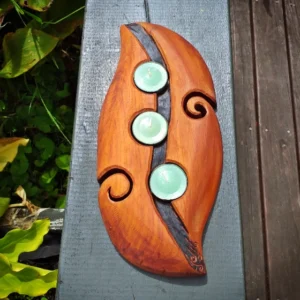 Carved kauri candle holder